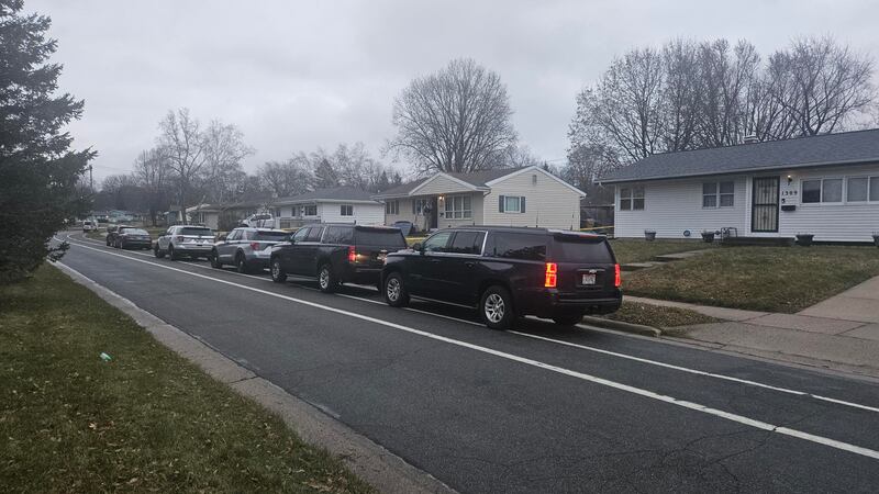 The front door of the home was seen completely off its hinges.