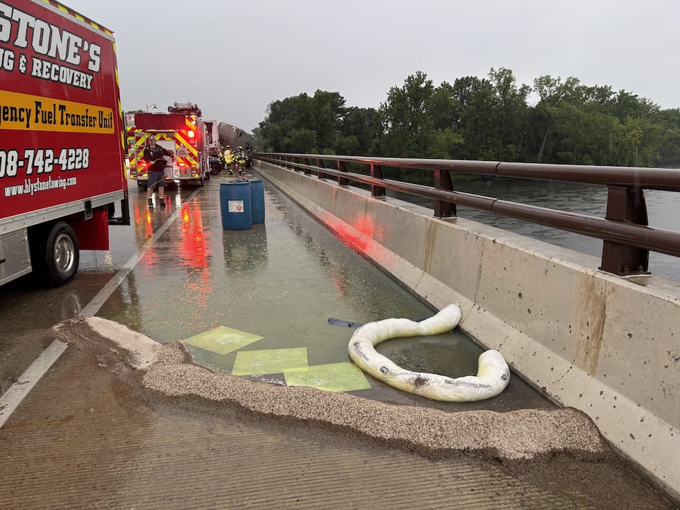 A semi crash caused a diesel fuel spill on a bridge over the Wisconsin River near Portage, the...