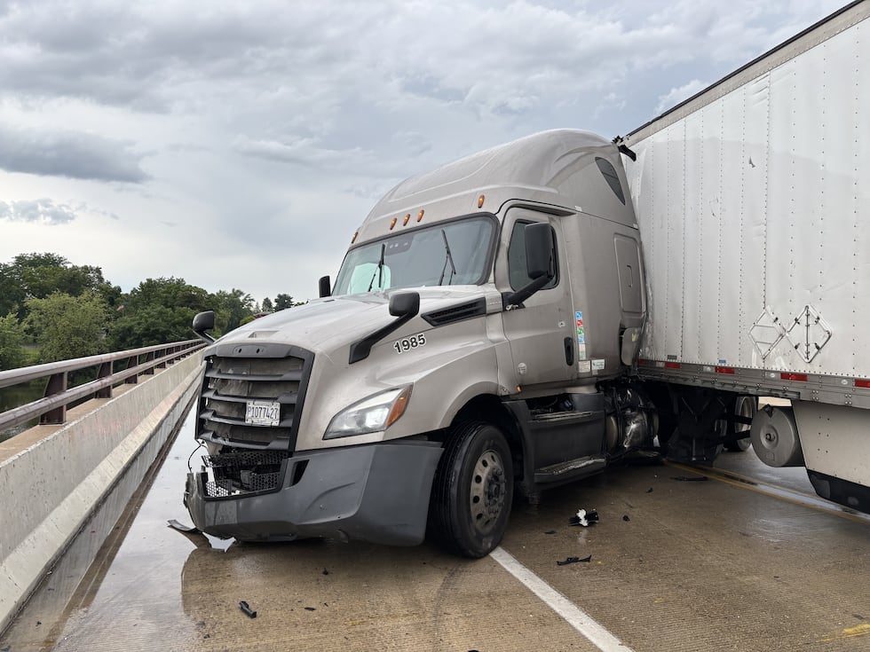 A semi crash caused a diesel fuel spill on a bridge over the Wisconsin River near Portage, the...
