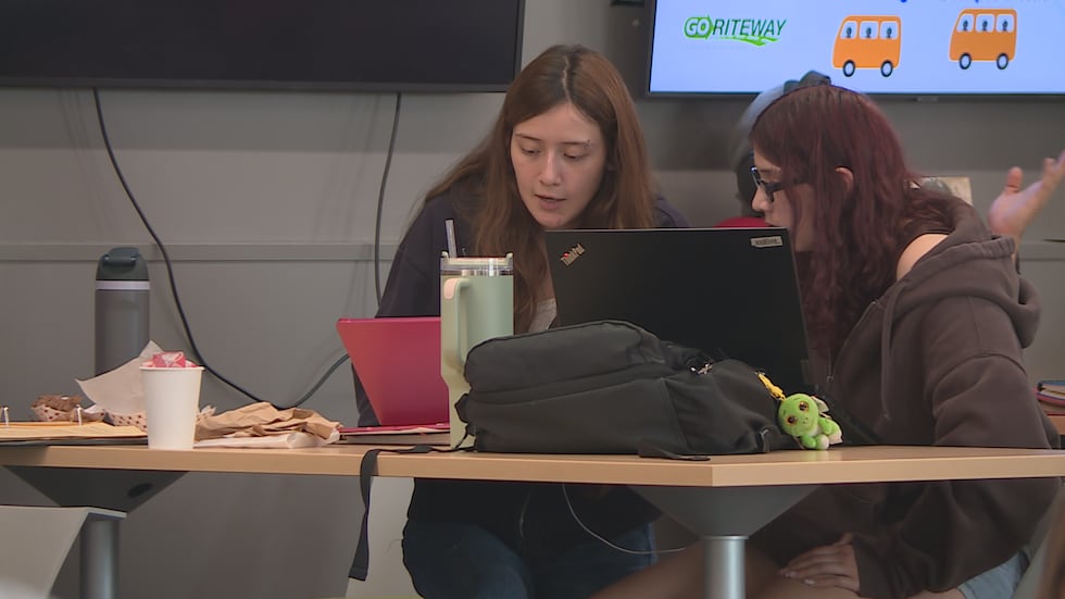 Students collaborate on campus.