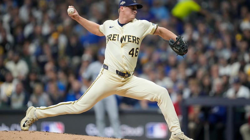 FILE - Milwaukee Brewers pitcher Quinn Priester throws against the Los Angeles Dodgers during...