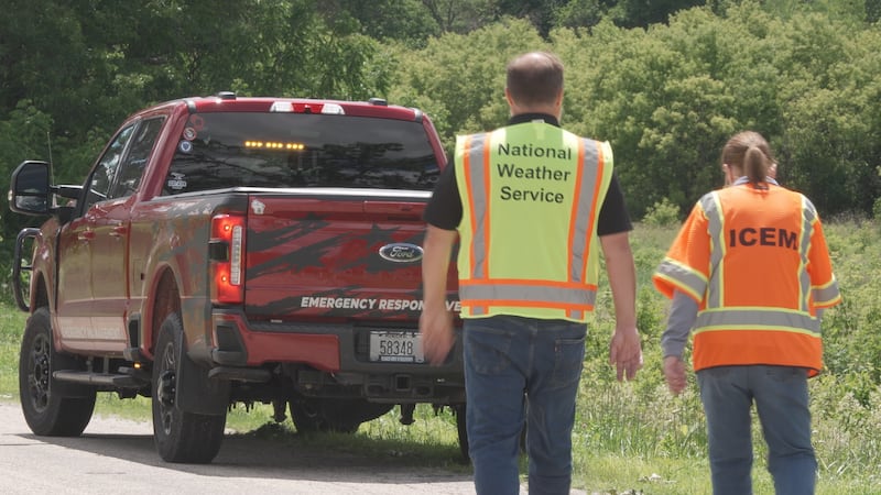 The National Weather Service and emergency management officials surveyed damage in Iowa County...