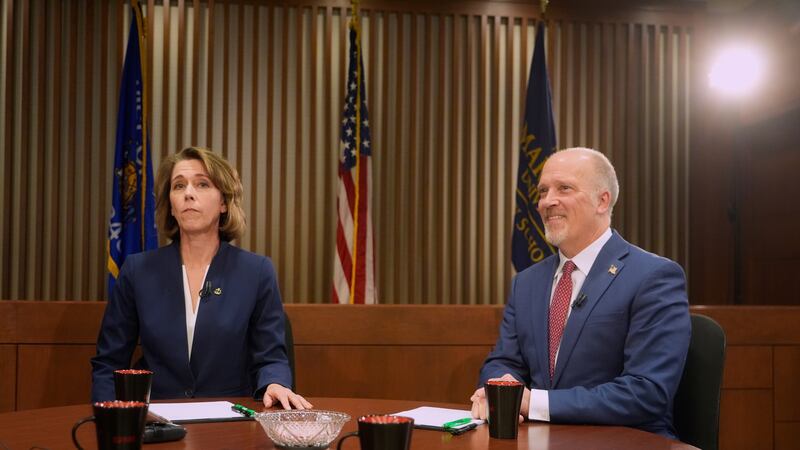 Wisconsin Supreme Court candidates Brad Schimel and Susan Crawford are seen before a debate...